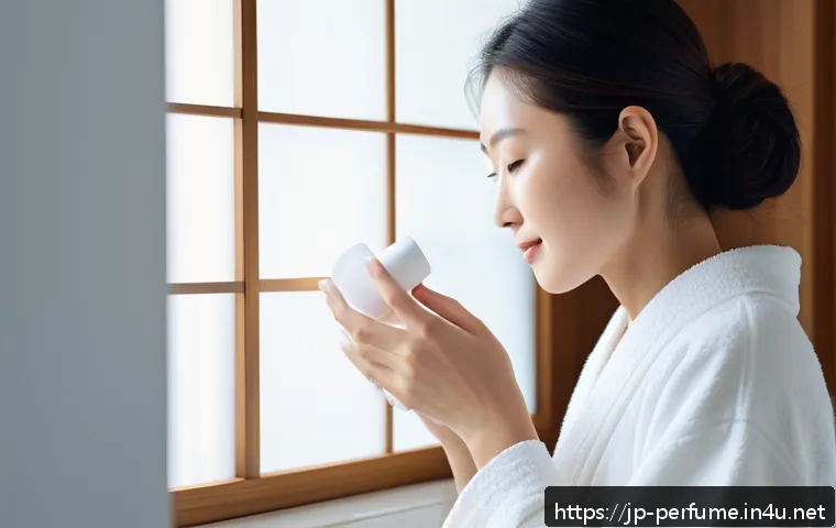 향수 오래 지속시키는 법 - A serene Japanese woman in a modern bathroom applying unscented moisturizing body lotion to her smoo...